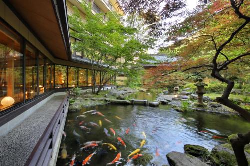 Atsumi Hotel | Discover Tachibanaya: 4-Star Retreat with Hot Tub & Dining