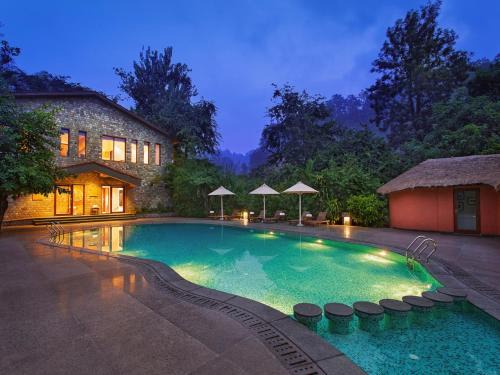 Garjia Resort | Discover Taj Corbett Resort and Spa with Pool & Spa Retreat