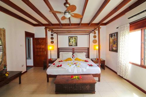 Mahe Island Bed & Breakfast | Discover Takamaka Green Village: Pet Friendly Oceanfront Retreat
