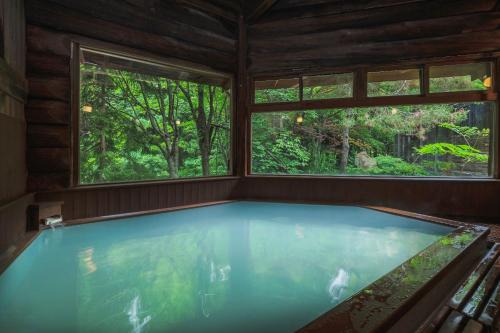 Zaoonsen Hotel | Eco-Friendly Comfort at Takamiya Hotel Hammond with Pool