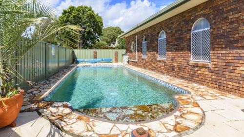 Bellara House | Cool Off at Eucalypt: Family-Friendly Pool Retreat