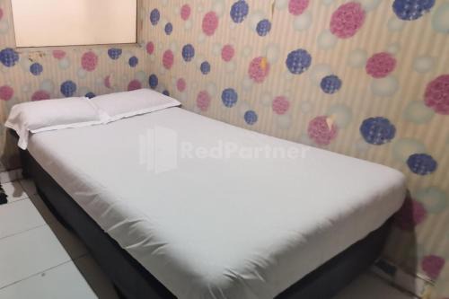 Old Jakarta Hotel | Comfortable Tangki Residence 1 RedPartner for Families