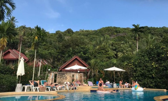 Baan Tai House | Relax at Tanouy Garden: Oceanfront Pool & Family-Friendly