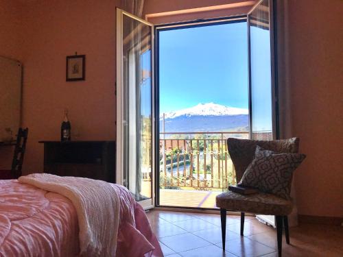 Chianchitta-Trappitello Apartment | Experience Taormina Etna View: Oceanfront Family Retreat