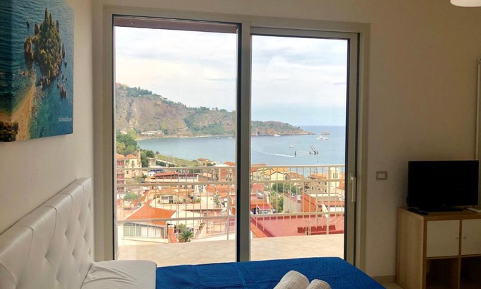 Villagonia Apartment | Discover Taormina's Inviting Solarium for Families