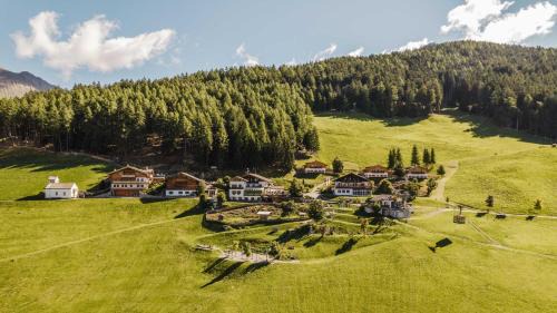 Schenna Hotel | Discover Familienalm Taser: Oceanfront Retreat with Spa