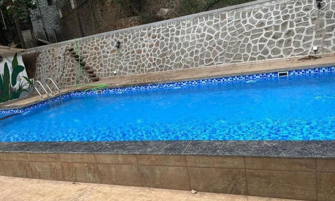 St.Stanislaus Villa Villa | Discover Taskeen Villa: Pet-Friendly Oasis with Pool