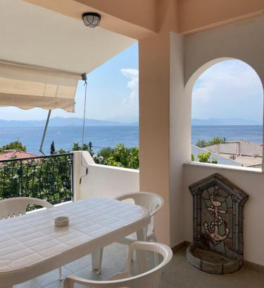 Agios Mamas Apartment | Explore Tasos Manaritsas Rooms with Oceanfront Views
