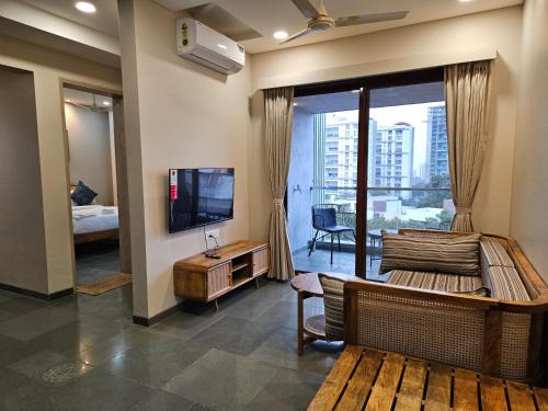 Undri Apartment | Cozy Tattva Presidential 1 BHK - Family-Friendly Retreat