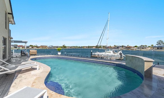 Yamba House | Tecoma 3 - Popular Waterfront Retreat with Pool Amenities