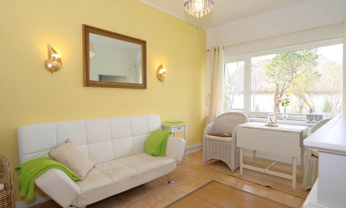 Archsum Apartment | Cozy Teewelkenhüs Meadow Apartment: Pet Friendly Getaway