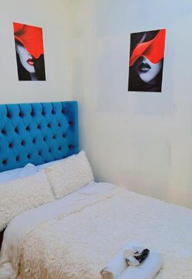 International City House | Accessible TellaHomes with Breakfast and Hot Tub Amenities