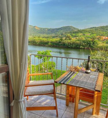Bosa Historic Centre House | Riverfront Bosa Apartments with Ocean View & Pet Friendly