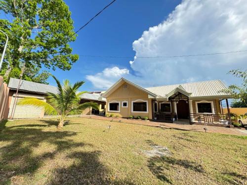 Dipolog House | Cozy TenEighteen Family Vacation Home with Breakfast Included