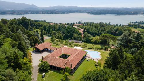 Carella Villa | Elegant Tenuta di Eupilio 18 with Oceanfront Pool Access