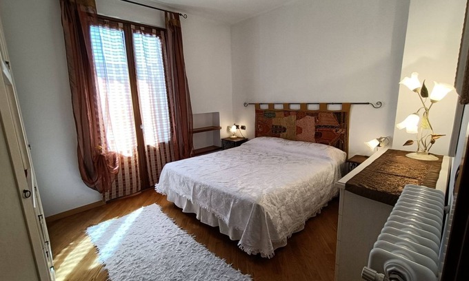 Dongo Apartment | Inviting Terraced House with Garden in Dongo - Larihome