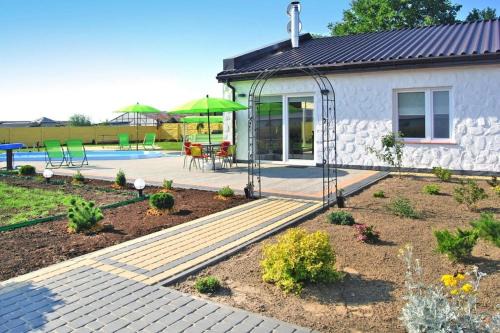 gmina Sianow House | Inviting Terraced House with Pool and Sauna in Sieciemin