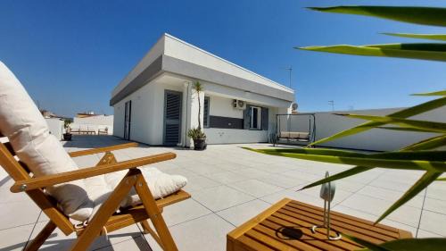 Vittoria Apartment | Discover Terrazza Bianca: Family-Friendly Stay with High Ratings