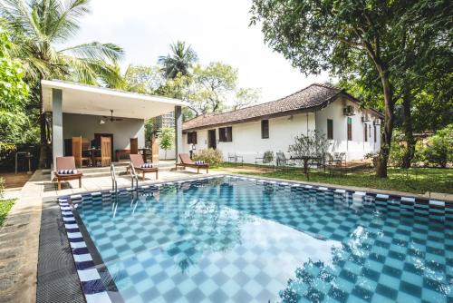 Jaffna Hotel | Discover Thambu Illam: Family-Friendly with Pool & Dining