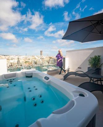 Pieta Apartment | Oceanfront Retreat: The Address Seafront Suites with Hot Tub