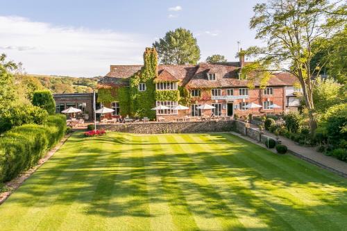 Alfriston Hotel | Discover Deans Place Hotel: Pet-Friendly with Pool Access
