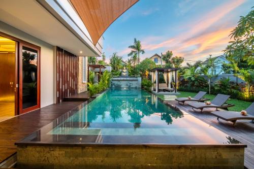 Taman Griya Villa | Indulge at The Amarta Villa: Oceanfront Bliss & Spa Retreat