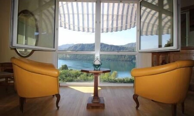 Pettenasco Apartment | Experience The Arch: Serene Lake Views and Garden Retreat