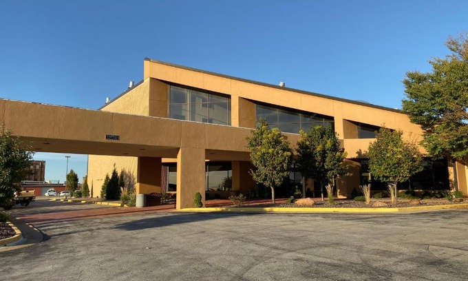 Quincy Hotel | Inviting Atrium Hotel on Third: Pool & Family-Friendly Stay