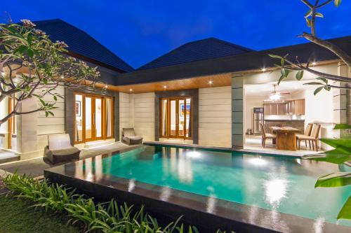 Dewi Sri Villa | Explore The Banyumas Suite Villa Legian: Poolside Retreat