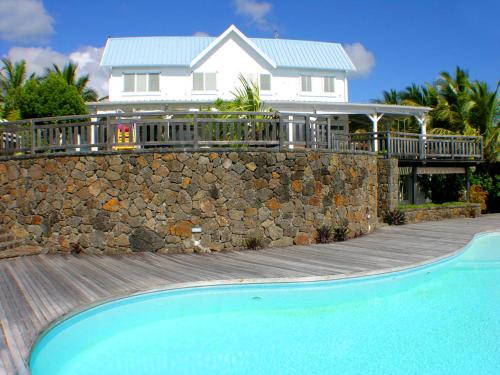 Trou d'Eau Douce House | Experience Oceanfront Bliss at The Bay Hotel - 4 Stars