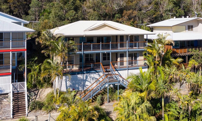 Brisbane Waterfront House | Beachaus: Beachfront Holiday Home with Pool & Ocean Views