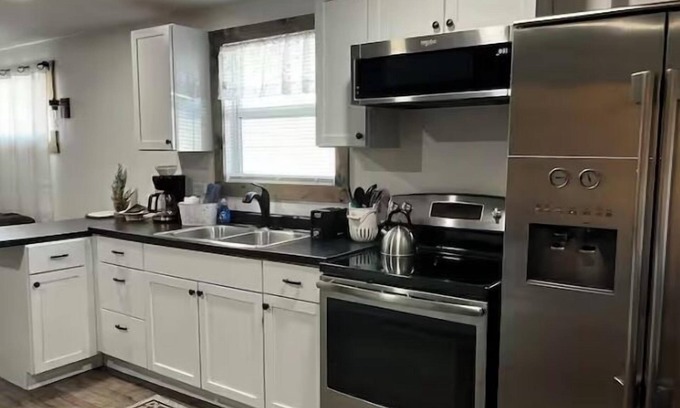 Aurora House | Relax at The Bear Cave with Hot Tub in Aurora Village