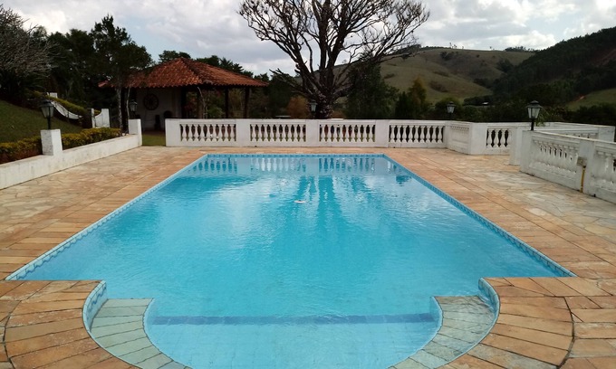 Socorro House | Dreamy Farm Retreat: Pool, Gardens & Ocean Views Await