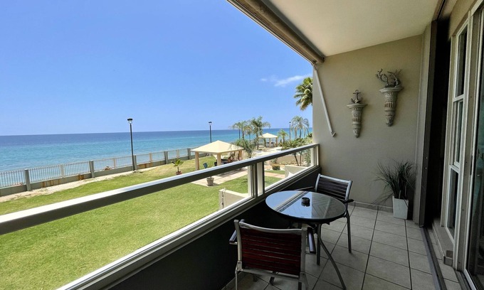 Stella Apartment | Top-Rated Beachfront Apartment with Pool and Ocean Views