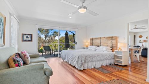 Hawks Nest House | Discover The Blue Beach House: Pet & Child Friendly Retreat