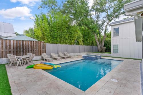 East Beach House | Relax at The Blue Door Cottage with Pool and Family Amenities
