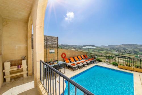 Ghasri House | Pet-Friendly Blue House Holiday Home with Pool & Hot Tub