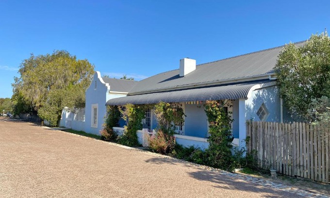 Stanford House | Inviting The Blue House: Pet-Friendly 4-Star Getaway