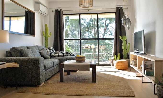 El Ejido Apartment | Trendy Boho-Chic Oasis: City Center Apartment with Kids Amenities