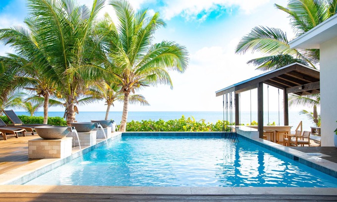 Farmer's Hill Villa | Unwind at The Breakwater: Swim-Up Pool Bar & Beach Bliss