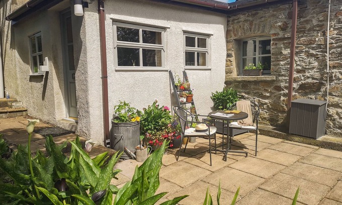 Rhosybol Cottage | Cozy The Byre: Character Cottage with Open Fire in Dulas