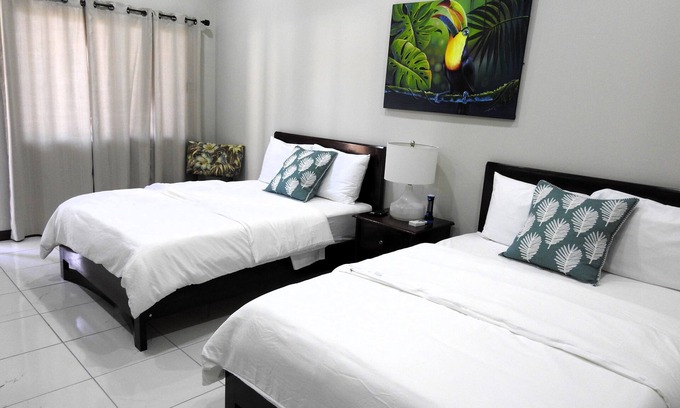 Independence and Mango Creek Hotel | Unforgettable Stays at The Toucan Inn with Spa & Dining