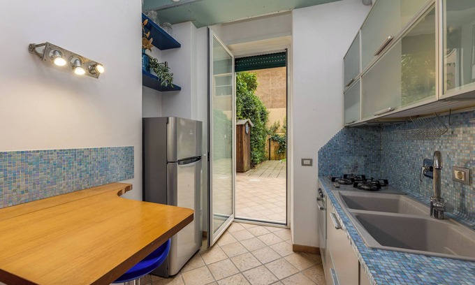 Tuscolano Apartment | The captain's cabin In style in this downtown space.