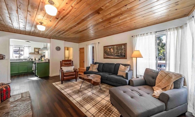 West Village Cabin | Experience The Cedar House: Walk to Town with Cozy Fireplace