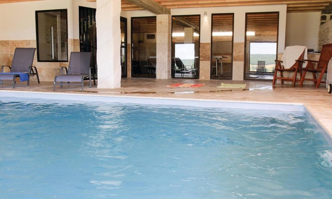 La Touche House | Inviting Cottage Retreat with Indoor Pool & Spa Experience