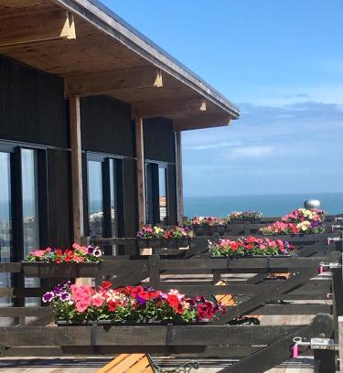 Papatotara Cabin | Guest Rated: The Cliffs Seaside Lodge with Oceanfront Views