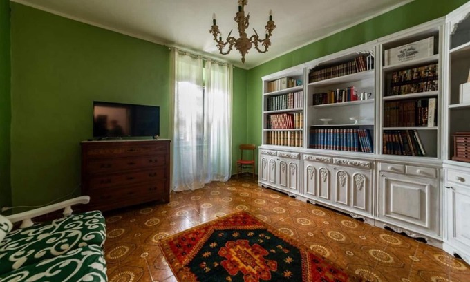 Civitavecchia Apartment | Experience The Colorful House: Oceanfront Views Await!