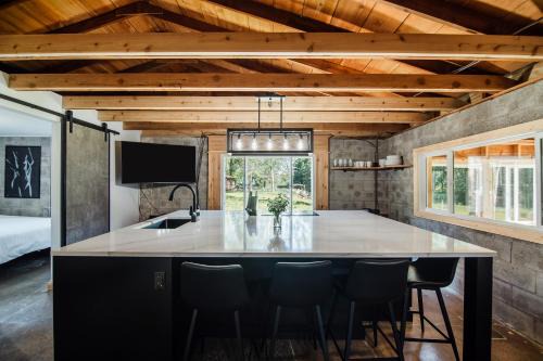 Bellaire House | Elegant Oceanfront Retreat at The Cottage by Wanderlust Abodes