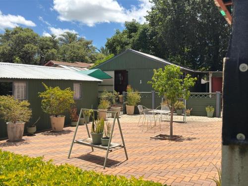 Flora Park Apartment | Cozy Getaway at The Cottage Polokwane with Breakfast Included