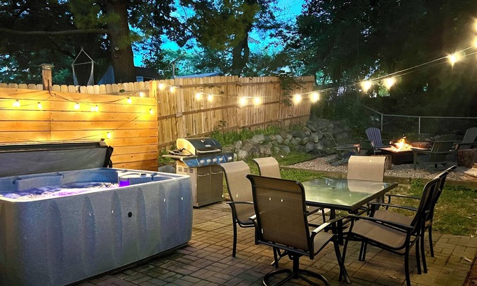 Des Moines House | The Cow Tipper: Family-Friendly Getaway with Spa & Game Room